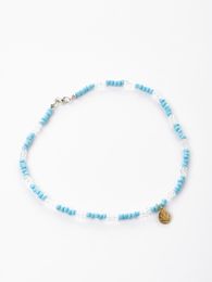 Цепочка из бисера с золотым смайлом xarid qilish